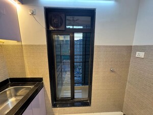 Kitchen in 2 BHK Apartment at Acme Oasis, Kandivali East – for Rent