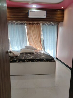 Bedroom in 2 BHK Apartment at Royal Palms Garden View, Goregaon East – for Sale