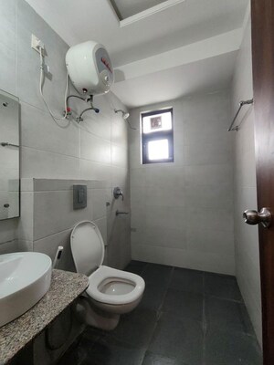 Bathroom in 3 BHK Builder Floor at Unitech Greenwood City Apartment, Sector 45 – for Rent