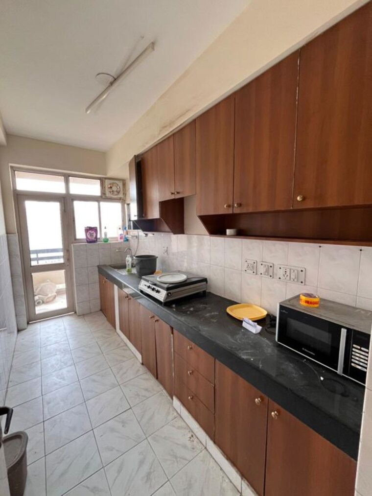 Kitchen, ansal-sushant-estate 2 Bedroom 980 Sq.Ft. Apartment In Sector 52 Gurgaon 10145071