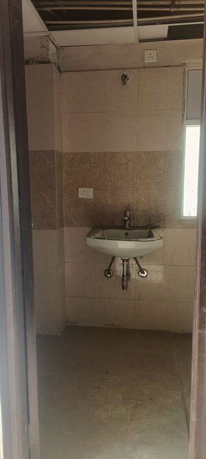 Bathroom in 2 BHK Apartment at Amrapali Golf Homes, Sector 4 Greater Noida – for Sale