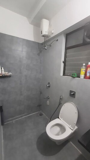 Bathroom in 2 BHK Apartment at Roshan Milestone, Tathawade – for Rent