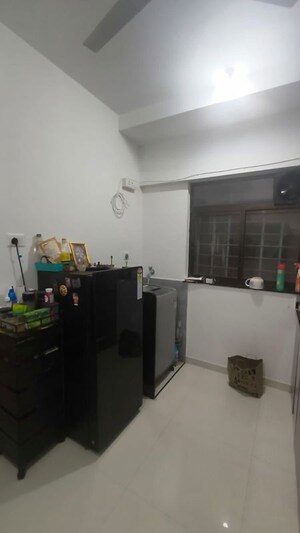 Kitchen in 2 BHK Apartment at Roshan Milestone, Tathawade – for Rent