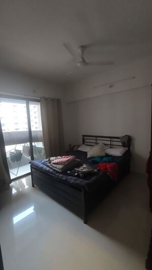 Bedroom in 2 BHK Apartment at Roshan Milestone, Tathawade – for Rent