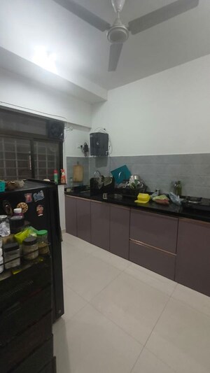 Kitchen in 2 BHK Apartment at Roshan Milestone, Tathawade – for Rent