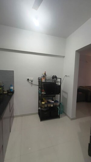 Living Room in 2 BHK Apartment at Roshan Milestone, Tathawade – for Rent