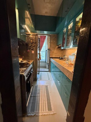 Kitchen in 3 BHK Apartment at Shrushti CHS Ltd, Andheri East – for Sale