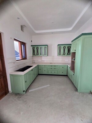 Kitchen in 4 BHK Apartment at Sunny Enclave – for Sale