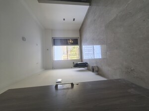 Living Room in 1 BHK Apartment at Crescent Silverwoods, Powai – for Rent