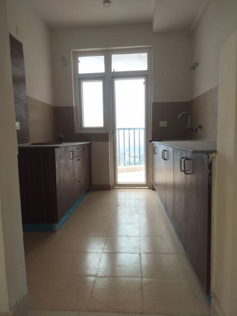 Kitchen, amrapali-heartbeat-city 3 Bedroom 1350 Sq.Ft. Apartment In Sector 107 Noida 10146921