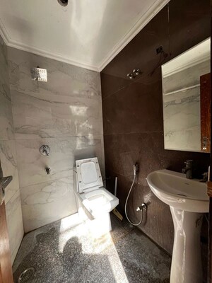 Bathroom in 3 BHK Builder Floor at Green Fields Colony – for Rent