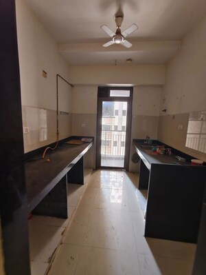 Kitchen in 1.5 BHK Apartment at Lodha Splendora, Ghodbunder Road – for Rent