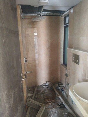 Bathroom in 2 BHK Apartment at Chandak 34 Park Estate, Goregaon West – for Rent