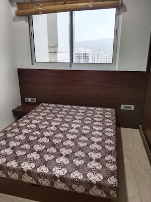Bedroom in 3 BHK Apartment at Omkar Alta Monte, Malad East – for Rent