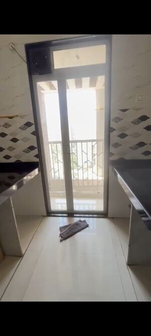 Kitchen in 2 BHK Apartment at JVM Veda, Kasarvadavali – for Rent