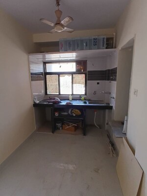 Living Room in 1 BHK Apartment at Millennium Tower, Kandivali East – for Rent