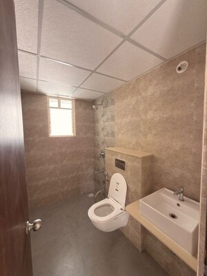 Bathroom in 3 BHK Apartment at Kolte Patil Little Earth, Kiwale – for Rent