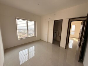 Room in 3 BHK Apartment at Kolte Patil Little Earth, Kiwale – for Rent