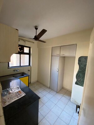 Kitchen in 1.5 BHK Apartment at Godrej Emerald, Ghodbunder Road – for Rent