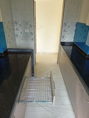Kitchen in 1 BHK Apartment at Srishti Elegance, Bhandup West – for Sale