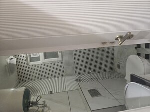 Bathroom in 3 BHK Builder Floor at Surajmal Vihar – for Sale