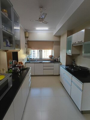 Kitchen in 3 BHK Apartment at Lokhandwala Whispering Palms XXclusives, Kandivali East – for Rent