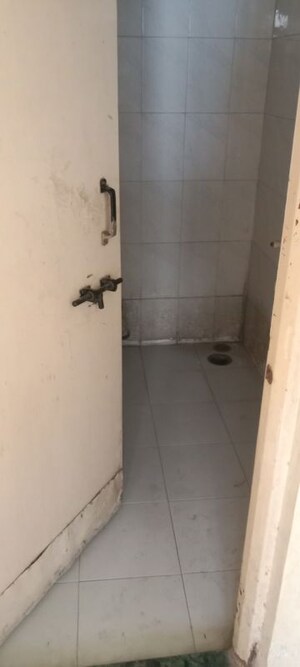 Bathroom in 1 BHK Apartment at Patil Raghukul Nagari CHS, Bopodi – for Rent