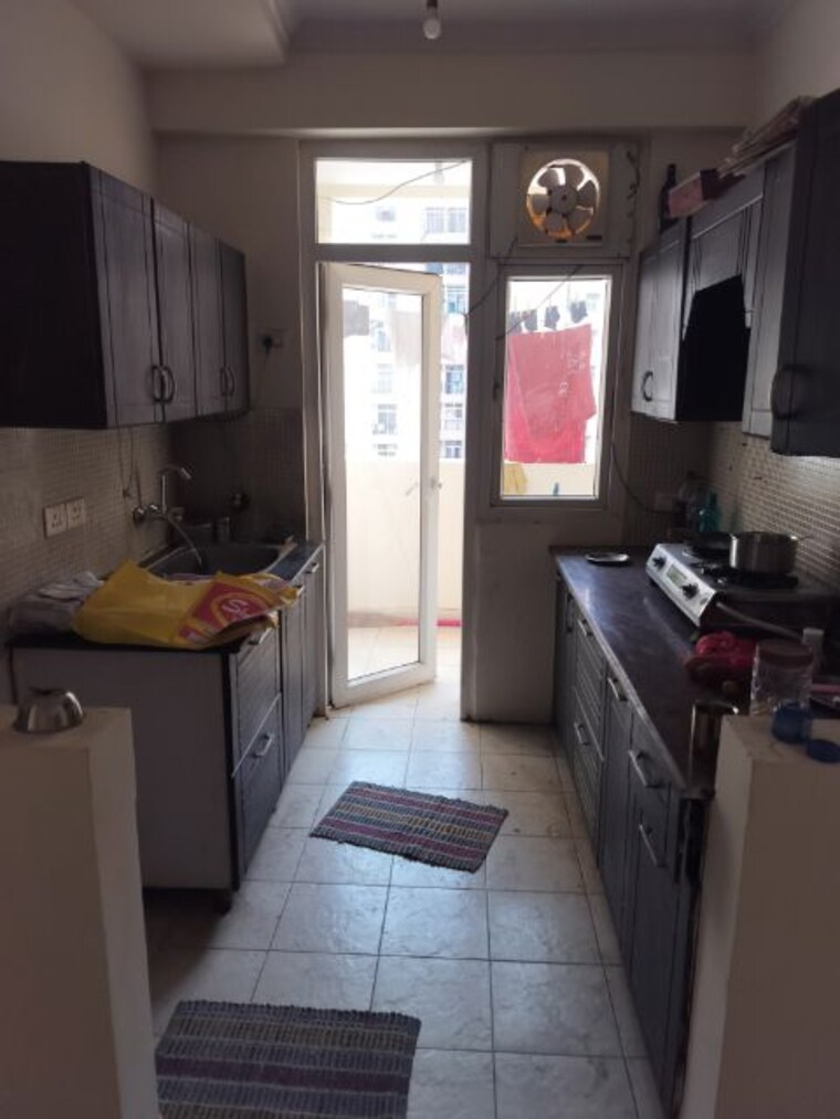 Kitchen, amrapali-silicon-city 2.5 Bedroom 1080 Sq.Ft. Apartment In Sector 76 Noida 10148965