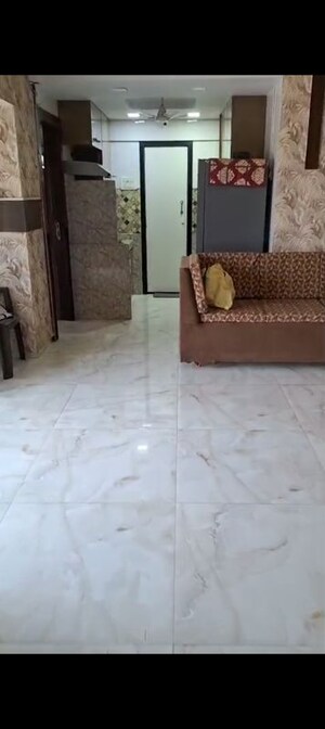 Living Room in 2 BHK Apartment at Yashodeep Castle CHS, Oshiwara – for Rent