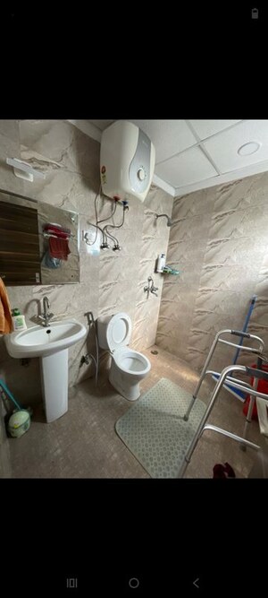 Bathroom in 1 RK Apartment at Aditya Urban Casa, Sector 78 – for Rent