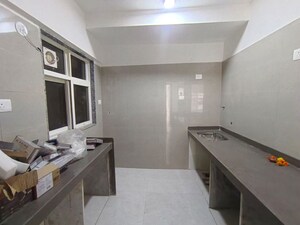 Kitchen in 2 BHK Apartment at Vaibhavlaxmi Queens Avenue, Chembur – for Rent