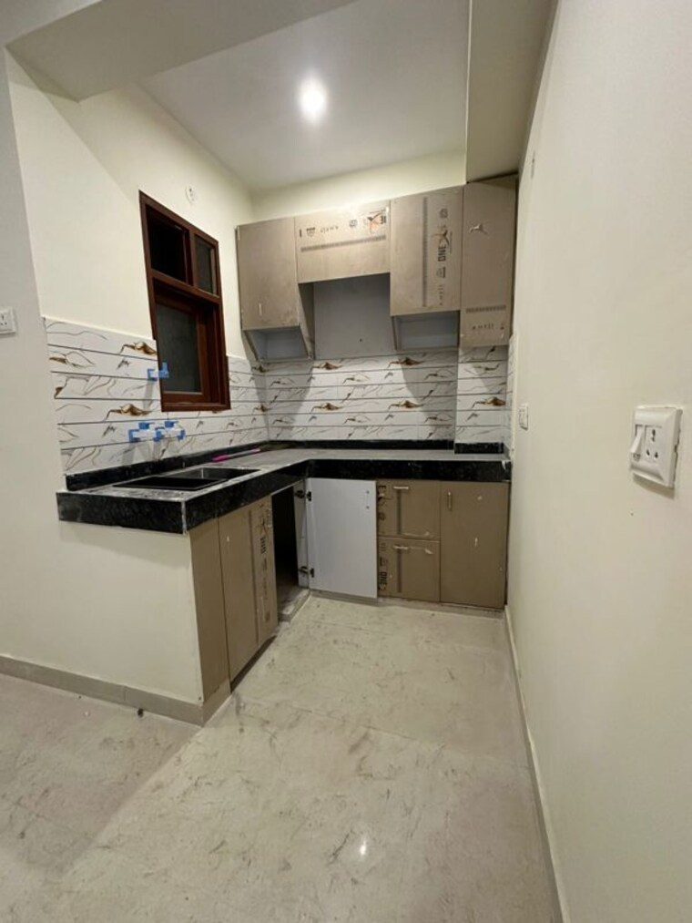 Kitchen, baraula 2 Bedroom 750 Sq.Ft. Builder Floor In Baraula Noida 10148128