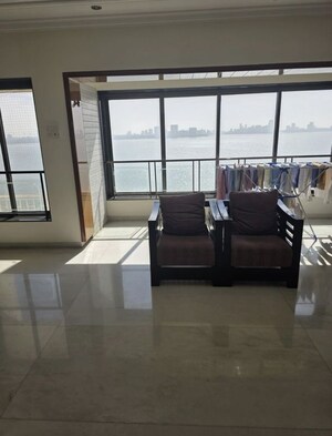 Living Room in 4 BHK Apartment at Walkeshwar – for Sale