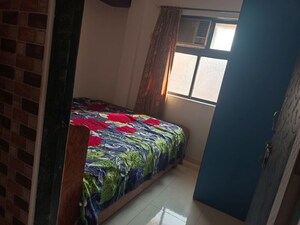 Bedroom in 1.5 BHK Apartment at Yashraj Park CHS, Kasarvadavali – for Rent