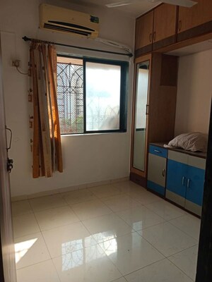 Bedroom in 1.5 BHK Apartment at Yashraj Park CHS, Kasarvadavali – for Rent