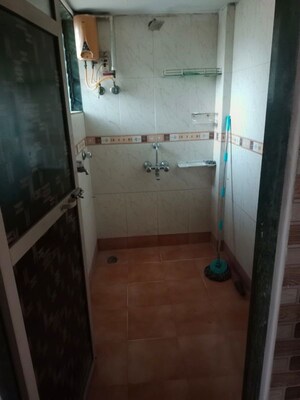 Bathroom in 1.5 BHK Apartment at Yashraj Park CHS, Kasarvadavali – for Rent