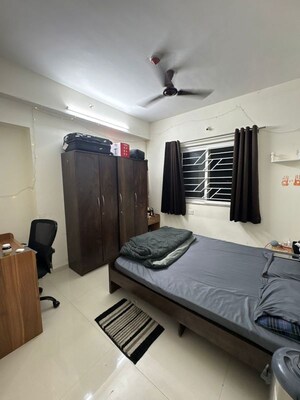 Bedroom in 3 BHK Apartment at Ayodhya Nagari CHS, Bopodi – for Rent