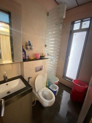 Bathroom in 1.5 BHK Apartment at Sheth Zuri, Laxmi Nagar – for Rent