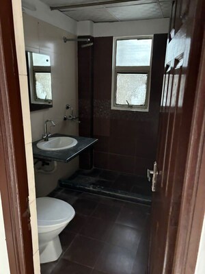 Bathroom in 4 BHK Apartment at Mahagun Maple, Sector 50 – for Rent