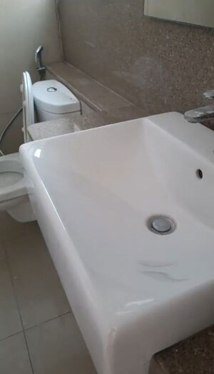 Bathroom in 3 BHK Apartment at Emaar Palm Gardens, Sector 83 – for Rent