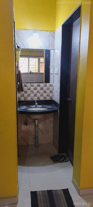 Bathroom in 1 BHK Apartment at Gulmohar Villa 2, Aundh – for Rent