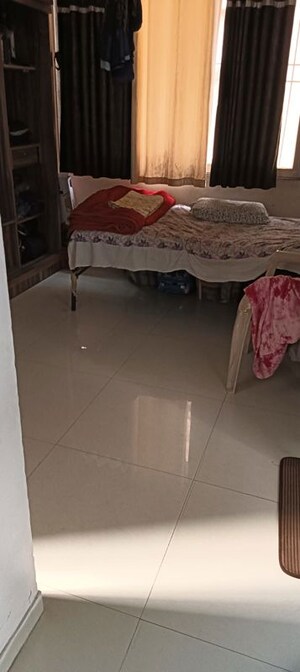 Bedroom in 2 BHK Apartment at Bhoomi Blessings, Rahatani – for Rent