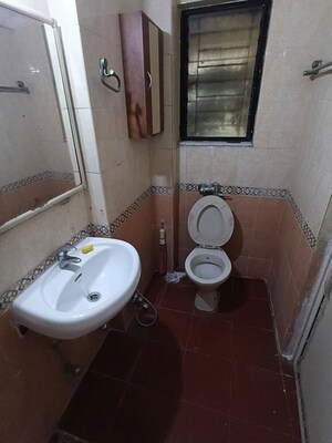 Bathroom in 2 BHK Apartment at Lokhandwala Whispering Palms, Kandivali East – for Rent