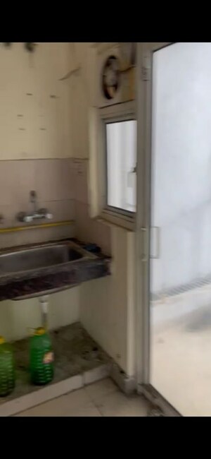 Kitchen in 2 BHK Apartment at Panchsheel Greens, Sector 16 Greater Noida – for Rent