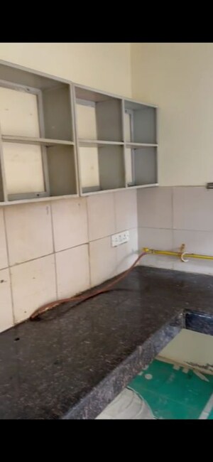 Kitchen in 2 BHK Apartment at Panchsheel Greens, Sector 16 Greater Noida – for Rent