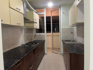 Kitchen in 2.5 BHK Apartment at Mahagun Mirabella, Sector 79 – for Rent