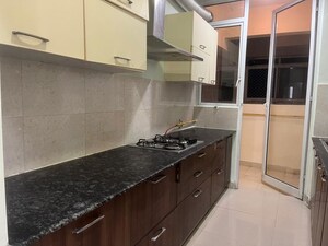 Kitchen in 2.5 BHK Apartment at Mahagun Mirabella, Sector 79 – for Rent
