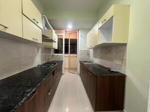 Kitchen in 2.5 BHK Apartment at Mahagun Mirabella, Sector 79 – for Rent