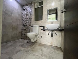 Bathroom in 2.5 BHK Apartment at Mahagun Mirabella, Sector 79 – for Rent