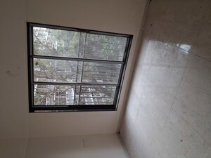 Room in 2 BHK Apartment at Pratham ARC Aura, Andheri West – for Rent